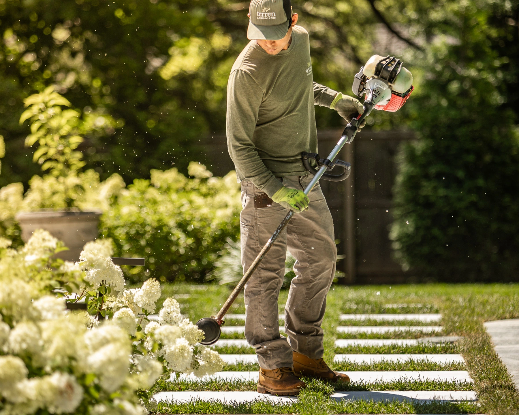 Fine Weed Trimming of Grass Grid Pavers