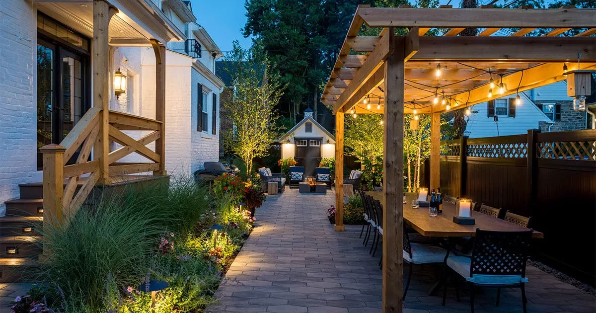 Outdoor Living Space with Pergola and Lighting in Wynnewood PA